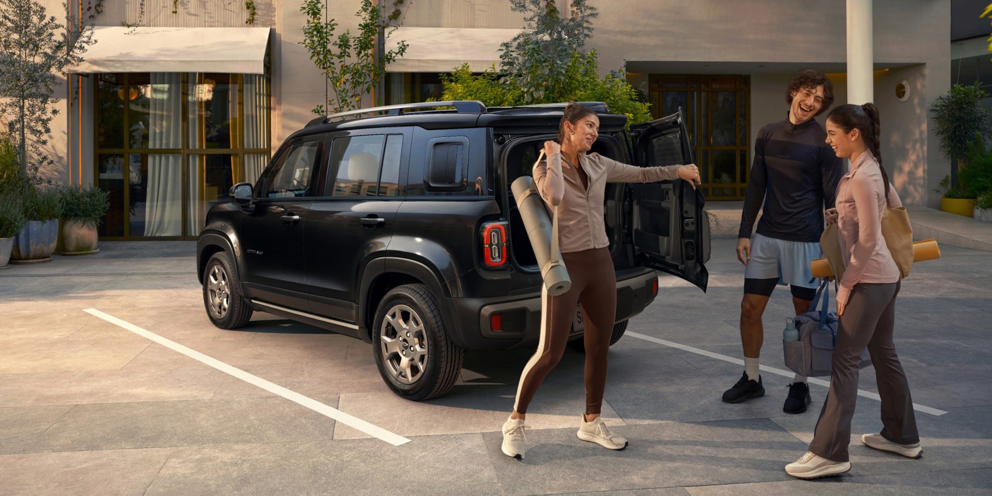 Familia feliz con Chevrolet Spark EUV